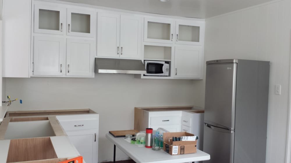 Cabinets and appliances installed - Victor White Handyman